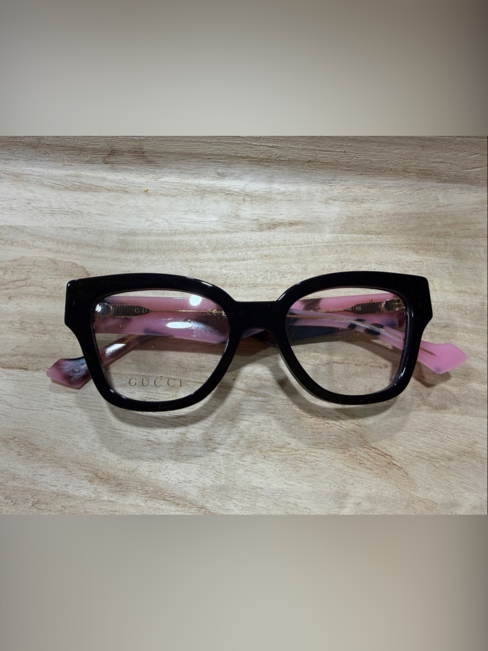 Gucci Black Frame Sunglasses with Pink Temples
